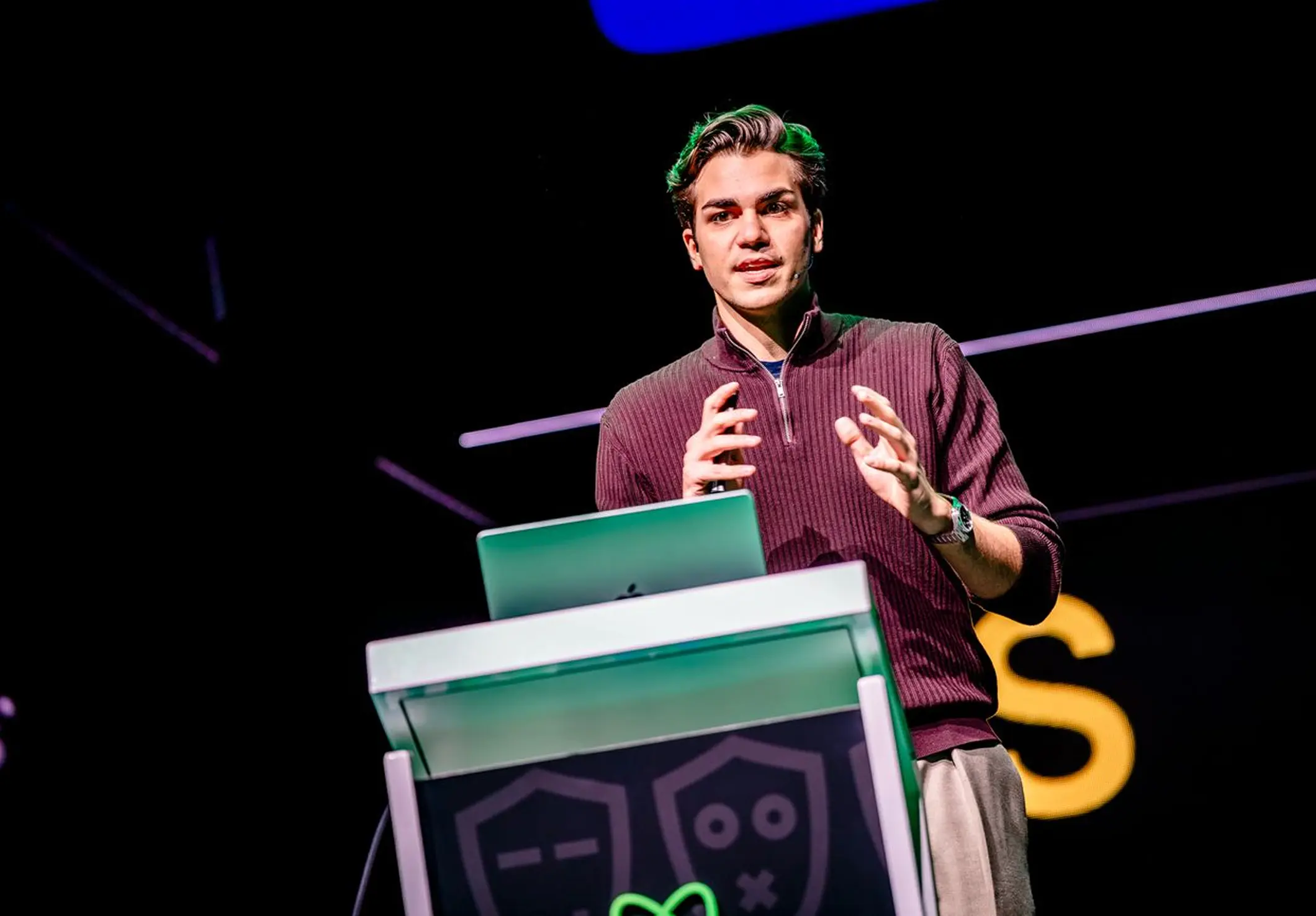 Adrian on stage at React Summit